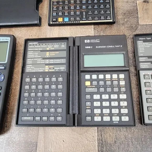 Lot of 4 Calculators HP 19B II, 12C, 28S, Texas Instruments TI-83 Plus For Parts - Picture 3 of 10